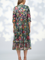 Floral print fabric dress titled "Looking Glass Tulle Dress - Ivy Multi" featuring a vibrant, colorful design shows the Backside 
