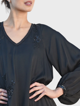 Black Sparkle All Night Dress featuring a fitted silhouette and shimmering embellishments for a glamorous evening look.
