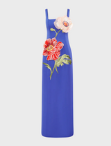 The dress features a patterned design and is designed for casual or cocktail occasions, showcasing her fashionable style. 