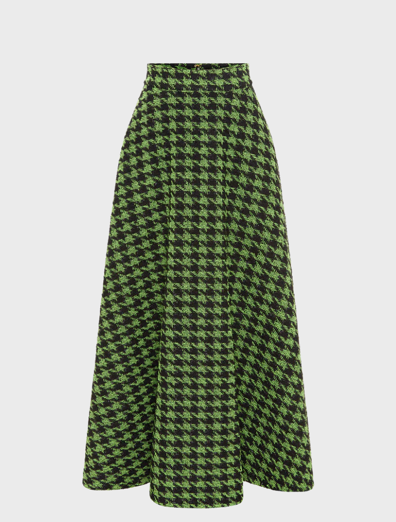 woman in a green and black houndstooth maxi Skirt