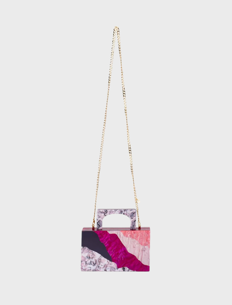 Pink and purple handbag with a chain strap, featuring a stylish Fleur Acrylic top handle design.