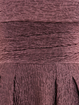 Elegant moonlight mauve midi dress with off-the-shoulder design, showcasing a fitted silhouette and a flowing skirt.