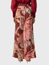 High-rise, wide-leg Adele Linen Viscose Pants in Cathedral Botanic, showcasing a breathable fabric and artistic earthy print.