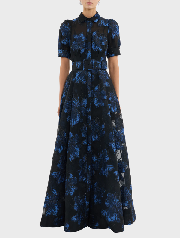 Short-sleeved black and blue floral dress, known as the Alexandra Gown in Navy.