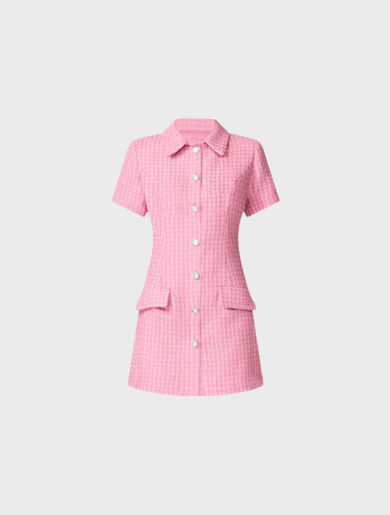 displays a pink shirt dress, complete with button accents.