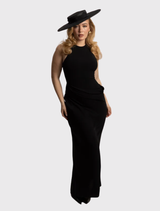 Sophisticated black racewear boater hat with minimalist ribbon trim and fitted headband for comfort and style at events.