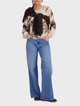 Savanna blouse featuring a sand pattern, showcasing a lightweight fabric and a relaxed fit for casual wear.