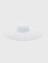 Elegant white Allegra Floppy Hat featuring a wide 18cm brim, ribbon detail, and short crown, ideal for fashionable events.