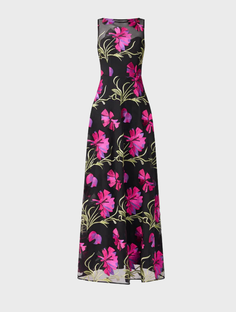 Black gown with delicate pink floral accents, offering a chic and graceful look for evening wear.