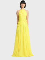 Amya Floral Applique Gown in Sunshine features a square neckline, ruched bodice with 3D petals, and criss-cross back.