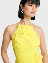 Premium ruched gown with square neckline, 3D floral appliques, adjustable criss-cross back, and relaxed skirt design.