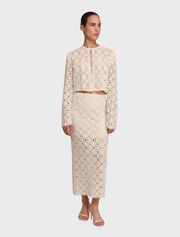 Anaya Skirt in ivory, featuring a flowing design and elegant silhouette, perfect for formal or casual occasions.