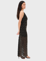 Black Anet Dress laid flat, highlighting its smooth fabric and classic cut.