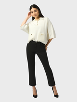Black ankle-length slim jeans displayed on a white background.