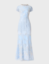 Annabelle's blue cap sleeve gown, characterized by its graceful lines and elegant style, suitable for upscale events.
