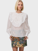 Thea Blouse in Antique features a floral lace bib yoke and ruffle trim, made from a silk cotton blend for a vintage look.