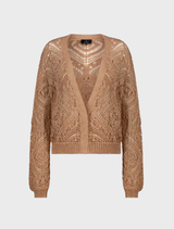 Biscotti-colored blouse adorned with appliqued flowers, showcasing a delicate and elegant design for casual wear.