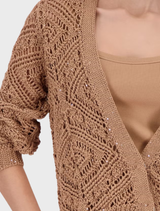 Floral appliqued blouse in a warm biscotti shade, designed for a chic and stylish appearance in everyday fashion.