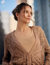 Appliqued floAppliqued flower blouse in biscotti color, featuring intricate floral designs and a stylish, feminine silhouette.wer blouse in biscotti color, featuring intricate floral designs and a stylish, feminine silhouette.