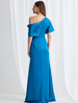 Aqua Halle gown draped elegantly, highlighting its sophisticated style and luxurious fabric.
