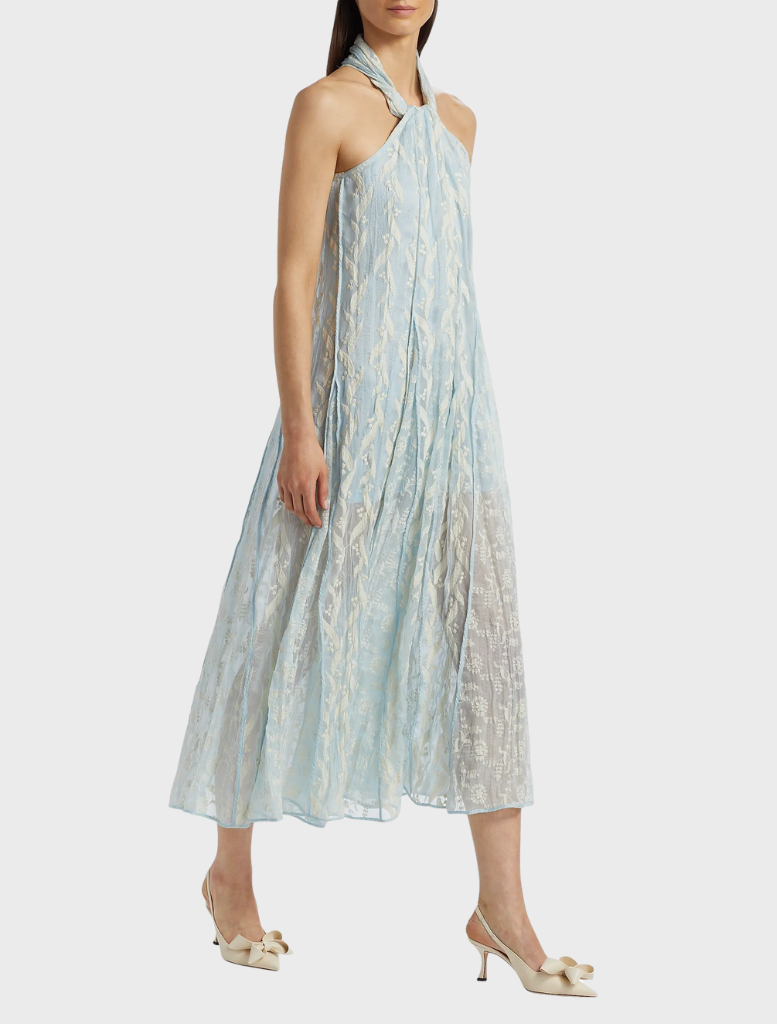 The Luana Dress in aqua, showcasing a soft fabric and graceful cut, perfect for summer occasions.