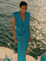 Elegant aquamarine Solstice Gown with a graceful fit, ideal for special events and formal gatherings.