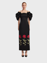 Elegant ebony maxi dress featuring intricate embroidery, perfect for formal occasions or evening events.
