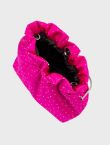 A chic pink clutch bag with a chain strap, named Archie Top Handle Pouch, perfect for adding a pop of color to any outfit.