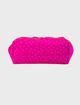 The Archie Top Handle Pouch, a pink clutch bag with a chain strap, combining elegance and modern design in fuchsia.
