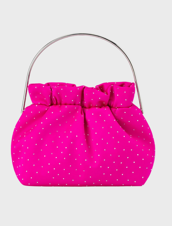 A fuchsia pink polka dot clutch bag featuring a stylish metal handle.
