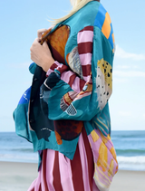 Multi-fish design on an "As You Like It" shirt, combining fun colors for a lively look.