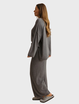 Cozy Winter Retreat Merino Cotton Pullover in ash, perfect for layering in chilly winter conditions.