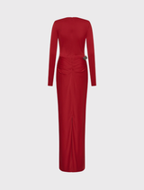 Red evening gown with a fitted silhouette, long sleeves, sculpted bodice, and decorative embellishments along the skirt.
