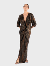 Long, flowing kimono sleeve maxi dress in an atomic print, featuring vibrant colors and a relaxed silhouette.
