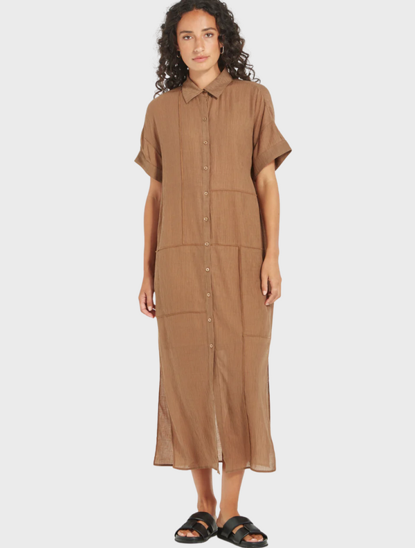 Woman wearing Aubrey Dress in bark, brown button-front midi dress with short sleeves from Mariko Boutique
