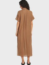 Back view of woman wearing Aubrey Dress in bark, brown button-front midi dress with short sleeves from Mariko Boutique