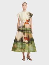 Aubrey's midi dress in a serene print, characterized by its flowing design and sophisticated style.