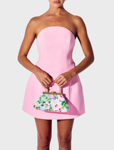 Model wearing a pink strapless mini dress holding the Audrey Sequin Top Handle - Aqua bag