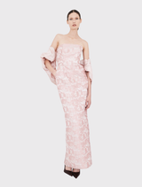 Two-tone pink strapless gown with a fitted bodice, elongated silhouette, soft pleats, and discreet pockets for added functionality.

