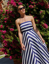 Audrey gown in royal stripe design, highlighting a chic silhouette and refined detailing for a stylish appearance.