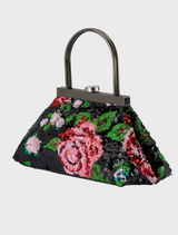  A black and pink floral bag featuring a stylish metal handle, perfect for casual outings or special occasions.
