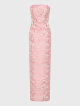 Elegant strapless gown with a floral jacquard design, structured bodice, and sleek pencil shape, complete with hidden pockets.