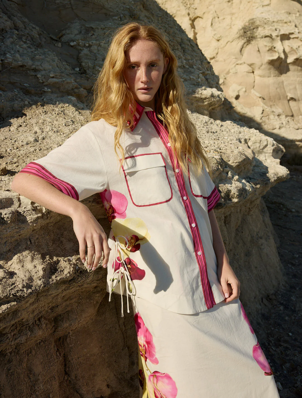 Ava Skirt in Antique Phalae pattern, featuring a floral design with soft, muted colors for a vintage-inspired look.