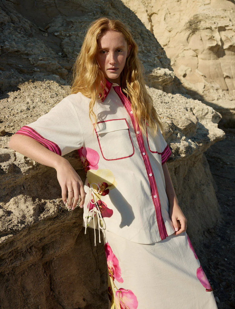 Ava Skirt in Antique Phalae pattern, featuring a floral design with soft, muted colors for a vintage-inspired look.