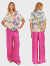 Aya Knit Collar Shirt from Markers collection, featuring bold "THINK positive" text and vibrant floral designs in pink and purple.
