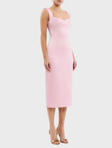 A pink dress showcasing a v-neck design and straps, ideal for a chic and fashionable appearance.