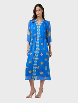 Ceylon Midi Dress in Azure Multi, showcasing custom embroidery, gathered side hems, and a stylish matching tie belt.