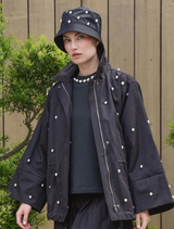  Black Baby I'm Back Jacket on a mannequin, illustrating its fashionable fit and design details.