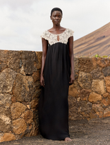 Long black and white dress in viscose georgette with ecru lace bib, featuring a soft, lightweight cut for comfort.