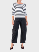Gravitene Barrel Leg Pant in black, offering a flattering silhouette with a flat-front waistband, elastic back, and side pockets.